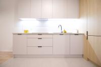 Kuchyňa alebo kuchynka v ubytovaní Hygge Malta - NOWY apartament