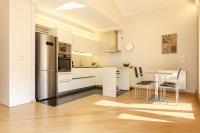A kitchen or kitchenette at Rizzoli Terrace Apartment