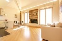A television and/or entertainment centre at Rizzoli Terrace Apartment