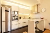 A kitchen or kitchenette at Rizzoli Terrace Apartment