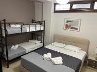 Posteľ alebo postele v izbe v ubytovaní Evgenia & Zoe Apartments