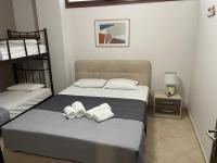 Posteľ alebo postele v izbe v ubytovaní Evgenia & Zoe Apartments