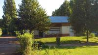 a small house in the middle of a field at Les Insolites du vélodrome d&#39;Albert in Albert