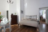 A bed or beds in a room at Napoli Pietrasanta LT