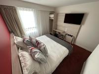 Posteľ alebo postele v izbe v ubytovaní Hôtel Akena Chauray-Niort