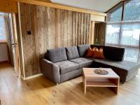 A seating area at Alpenapart Singer - contactless check-in