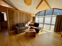 A seating area at Alpenapart Singer - contactless check-in