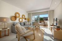A seating area at New & Beautiful Apt walk to the beach - RDR251