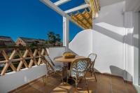 A balcony or terrace at New & Beautiful Apt walk to the beach - RDR251