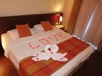 Uma cama ou camas num quarto em Hotel Da Montanha