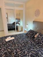 Posteľ alebo postele v izbe v ubytovaní Apartments Benalmadena