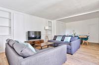 Telewizja i/lub zestaw kina domowego w obiekcie Appartement Quartier Le Marais 1 Free Netflix