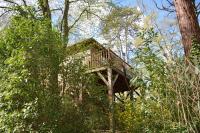 a tree house in the middle of the forest at Manoir Du Parc (Adults only) in Amboise