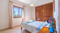 Postel nebo postele na pokoji v ubytování Villa Rito Nou