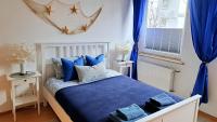 Posteľ alebo postele v izbe v ubytovaní Sea Side Apartment