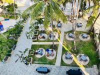 Vrt pred nastanitvijo Cowrie Shell Beach Apartments Official