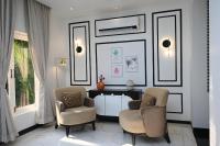 Richmonde Ananta Elite Luxurious Villa & Apartments,Goaにあるシーティングエリア