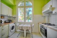 A cozinha ou cozinha compacta de IMMOGROOM -Terrace with garden - Quiet - Air-conditioner