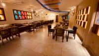 an overhead view of a restaurant with tables and chairs at Hotel Amar Palace in Ambāla