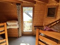Łóżko lub łóżka w pokoju w obiekcie Chalet le Grand Bec