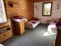 Łóżko lub łóżka w pokoju w obiekcie Chalet le Grand Bec