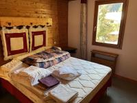 Łóżko lub łóżka w pokoju w obiekcie Chalet le Grand Bec