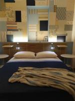 Posteľ alebo postele v izbe v ubytovaní Atelier B&B