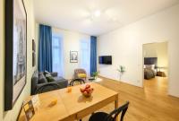 Televízia a/alebo spoločenská miestnosť v ubytovaní Jimmy's Apartments Dandelion