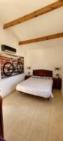 Postel nebo postele na pokoji v ubytování Velo Villa w/ A/C, free Wi-Fi & Pool near Benidorm