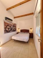 Postel nebo postele na pokoji v ubytování Velo Villa w/ A/C, free Wi-Fi & Pool near Benidorm