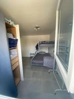 Łóżko lub łóżka w pokoju w obiekcie Appartement près de l aéroport CDG et Disneyland