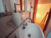 Kúpeľňa v ubytovaní Hellasz Apartman