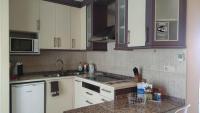 A kitchen or kitchenette at apartemento rural