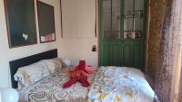 A bed or beds in a room at apartemento rural