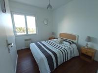 Łóżko lub łóżka w pokoju w obiekcie Gîte La Mer, 50m de la mer