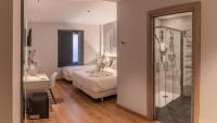 Hotel NERU con Encantoにあるベッド