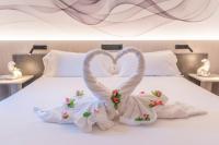 Hotel NERU con Encantoにあるベッド