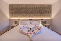 Hotel NERU con Encantoにあるベッド