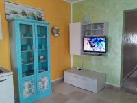 A television and/or entertainment centre at Musa Balbisiana Casa Citrus
