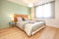 Łóżko lub łóżka w pokoju w obiekcie Appartement Modane Wifi stationnement gratuit