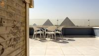 Balkón nebo terasa v ubytování Grand museum & Full pyramids View W Roof Top - Free BreakFast