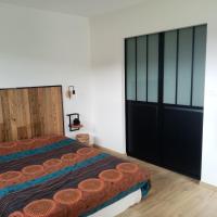 Posteľ alebo postele v izbe v ubytovaní Chambre chez l'habitant Aux portes du Mans Evénements circuits du Mans