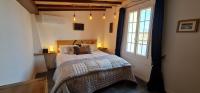 Posteľ alebo postele v izbe v ubytovaní Dom Peyreton Prestige cottages set in a charming wine property