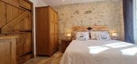 Posteľ alebo postele v izbe v ubytovaní Dom Peyreton Prestige cottages set in a charming wine property