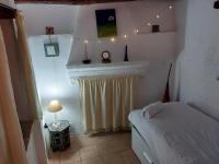 A bed or beds in a room at Casa Balcón