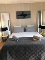 Łóżko lub łóżka w pokoju w obiekcie Appartement l'œil de Colmar