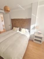 Postel nebo postele na pokoji v ubytování Apartment Sky Cervantes