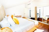 Postel nebo postele na pokoji v ubytování Tropical Flavour Apartment