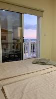 Postel nebo postele na pokoji v ubytování Moonlight Sea View Villa