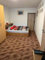 Postel nebo postele na pokoji v ubytování Apartmány Pod Chlumem